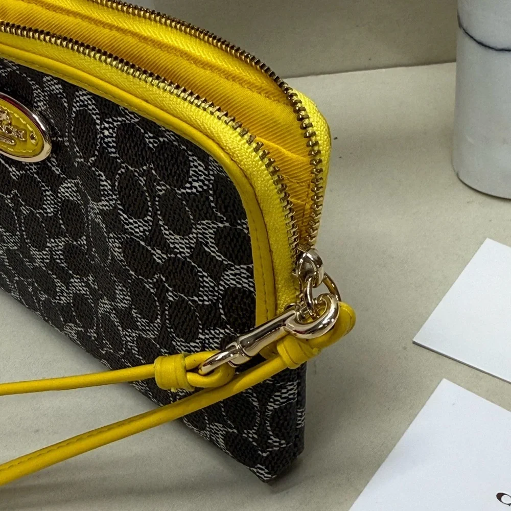 (new+tag) Coach signature monogram zippy wristlet wallet - fits iPhone Pro Max